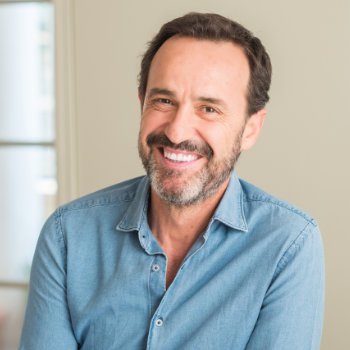 Handsome middle-aged man in blue shirt